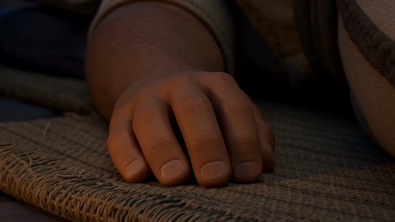 His hand rests flat on the sleeping mat