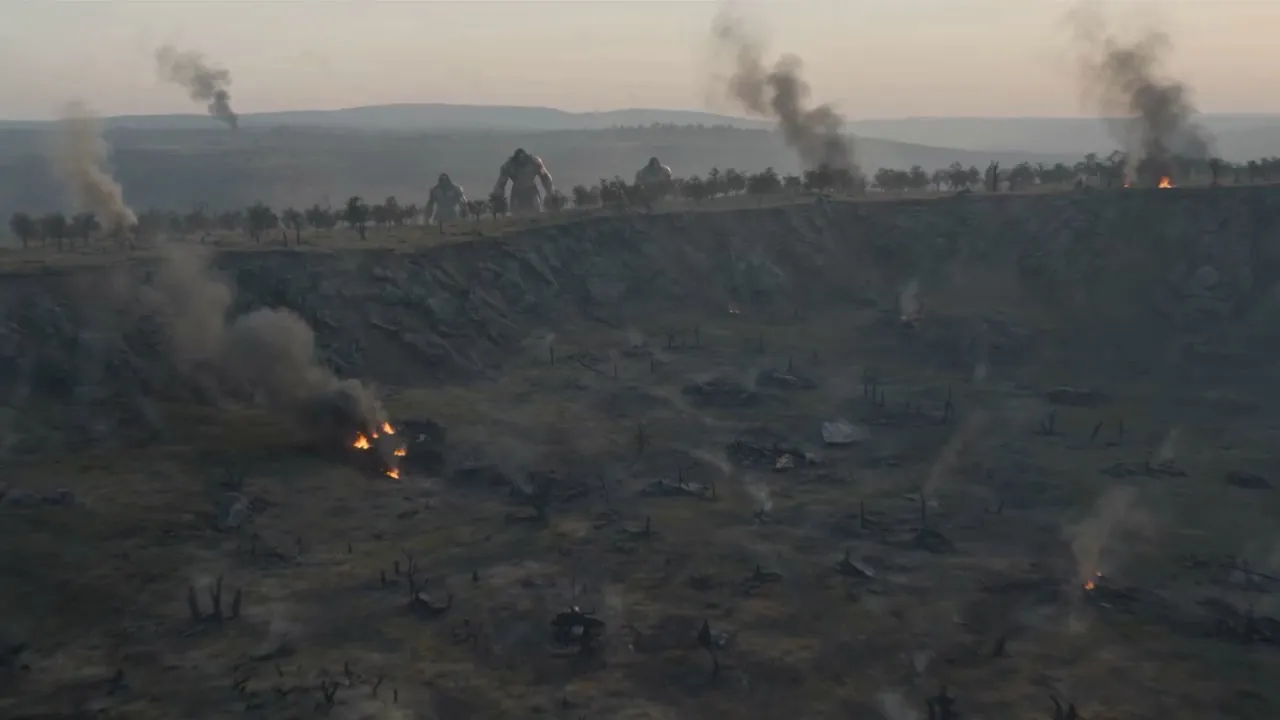 Giants march across a ravaged horizon trailing smoke