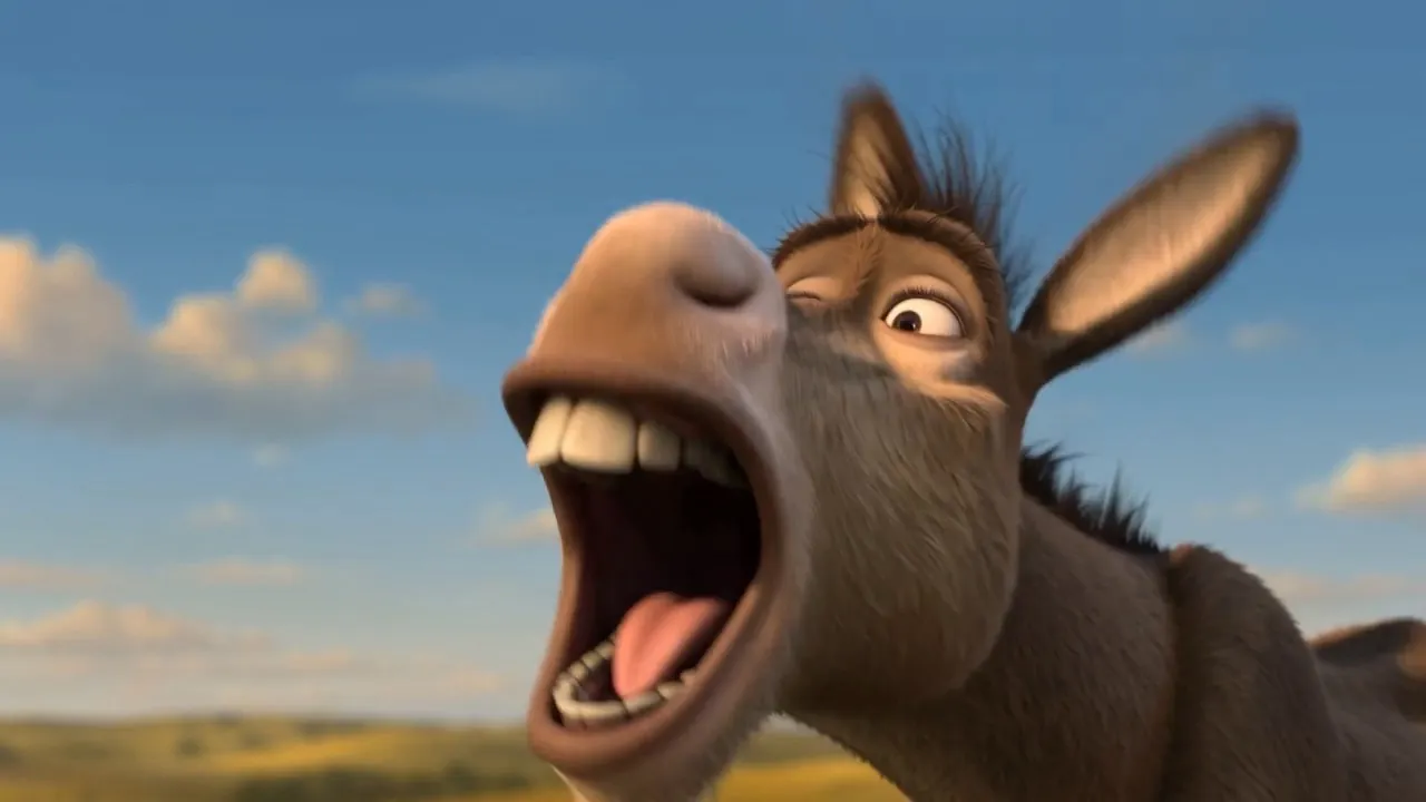 A wild donkey braying at nothing in particular