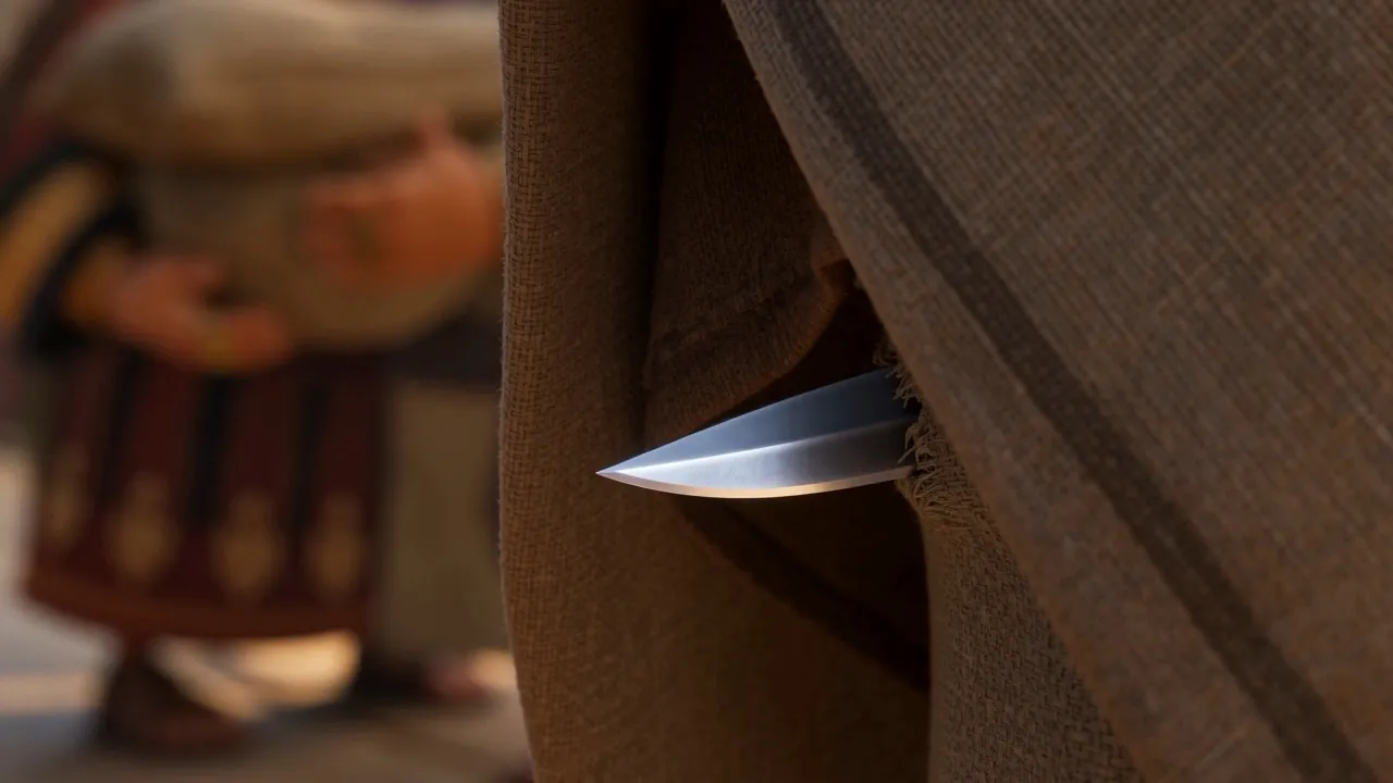 A blade, hidden, moving past under a cloak