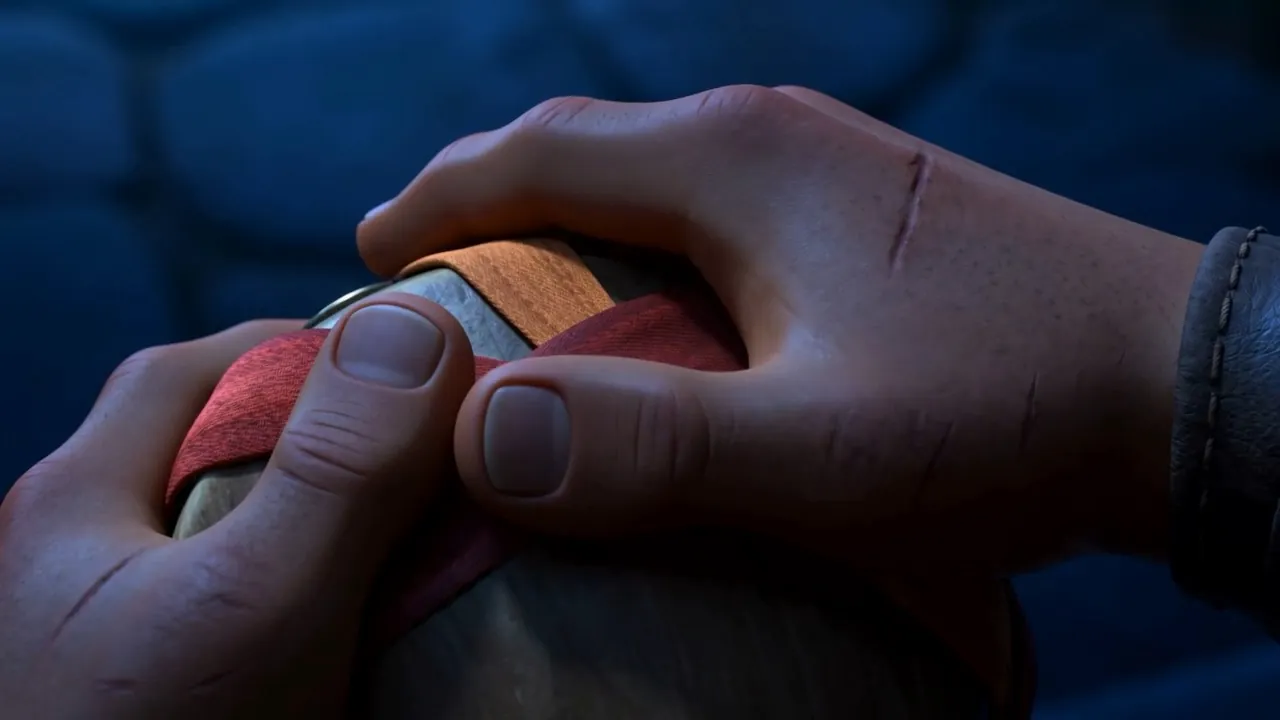 Close — ribbons, and a thumb on the rim