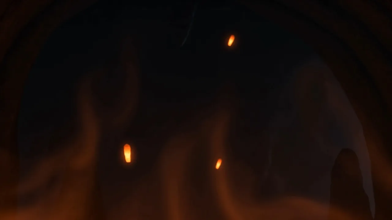 A few embers drift in the dark