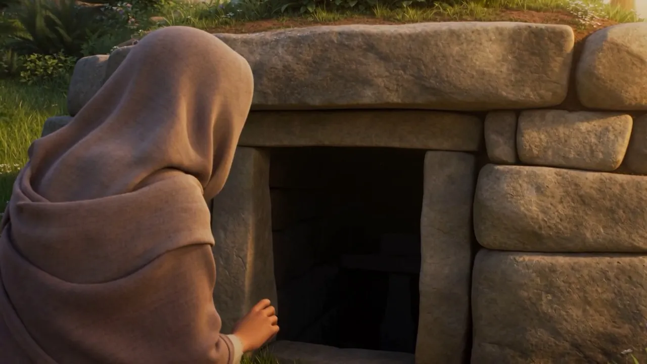 A hand on the doorway of an open tomb