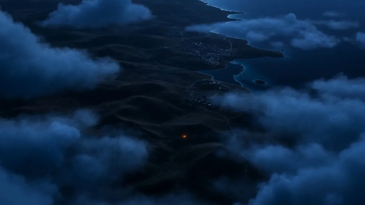 Night, high above a dark coastline