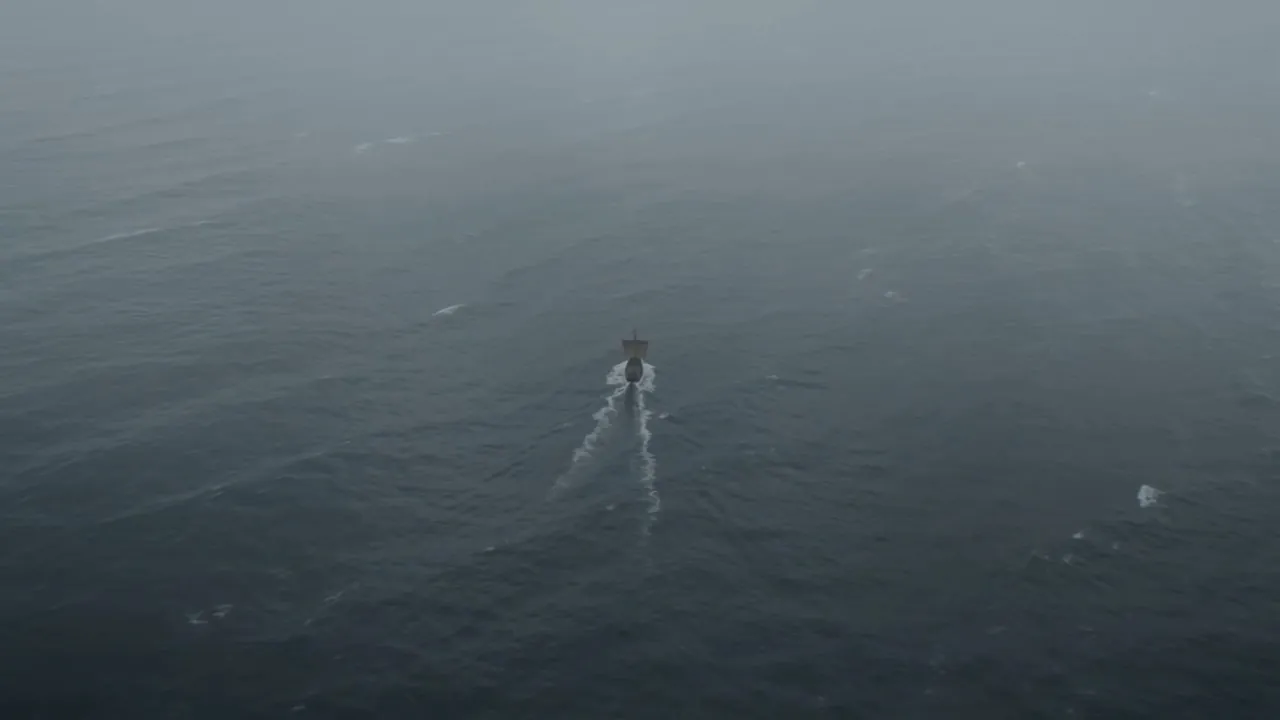Open water, and one small vessel on it