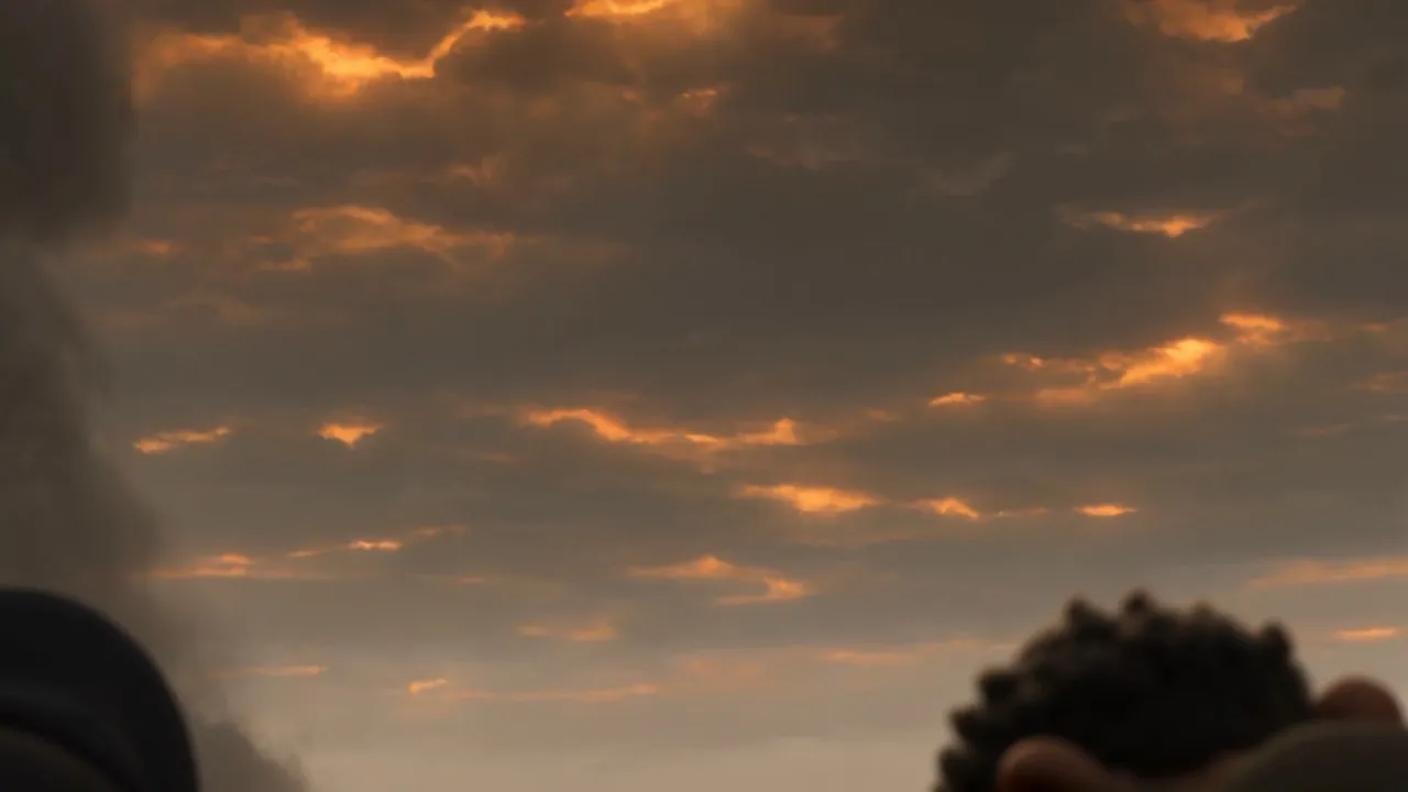 And above them the real sky is burning, ember on ember