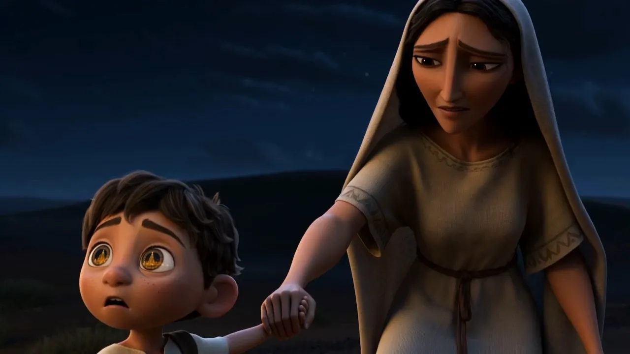 His mother feels the drag on her hand, and looks down