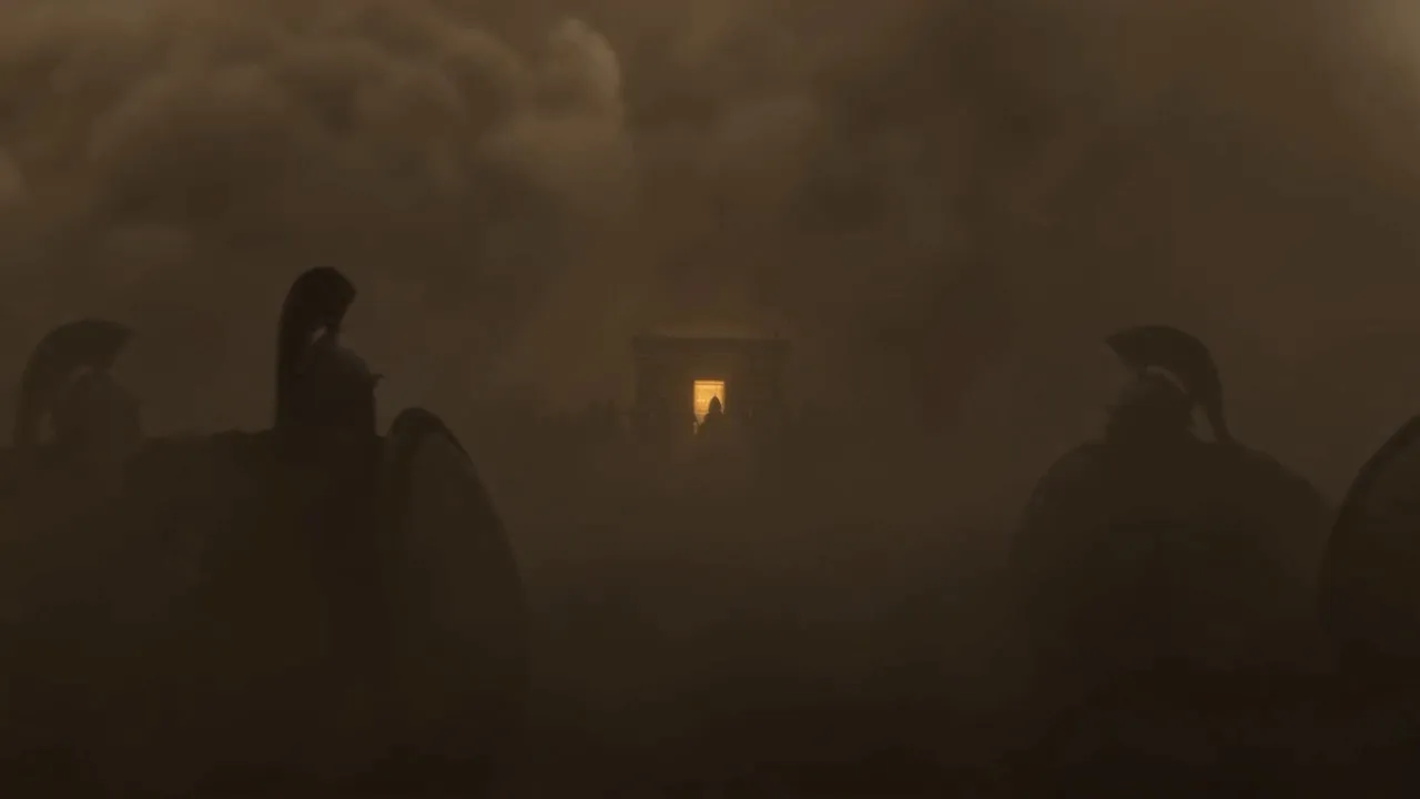 Silhouetted soldiers close around a small golden glow