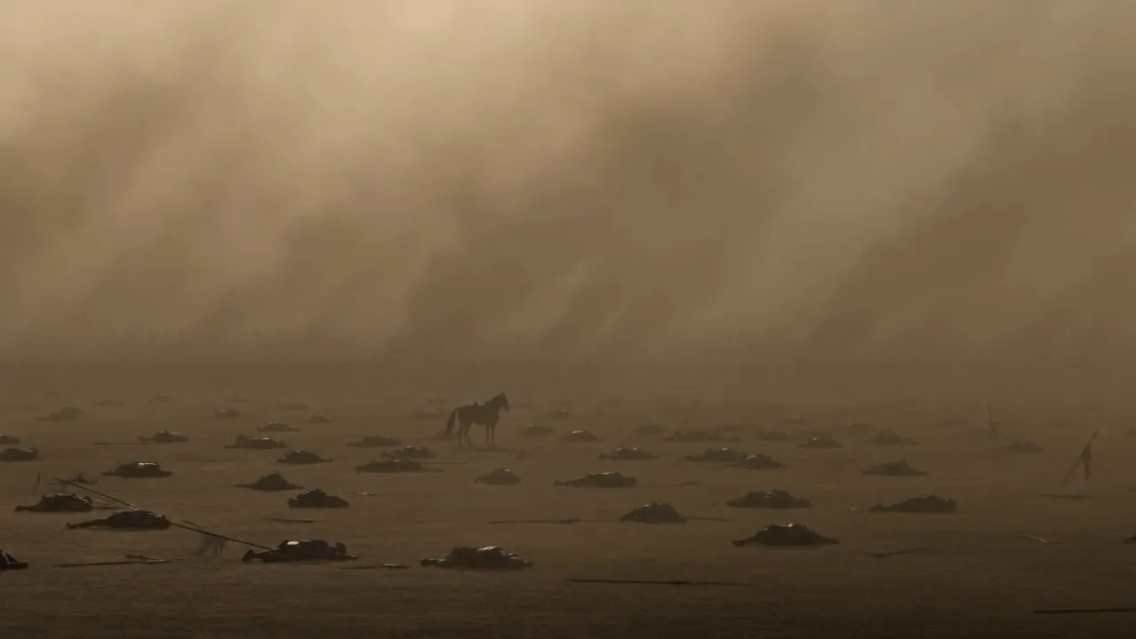 A lone riderless horse far off in the dust