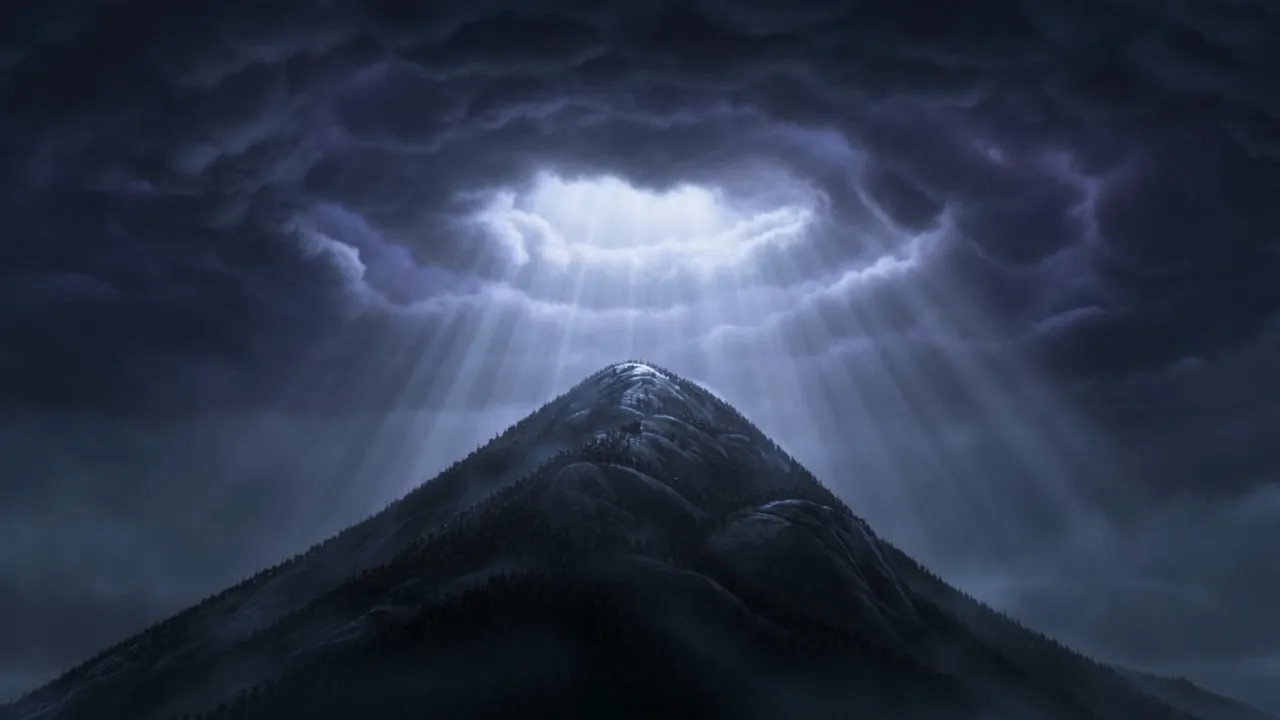 The clouds open, and light comes down onto the rock instead
