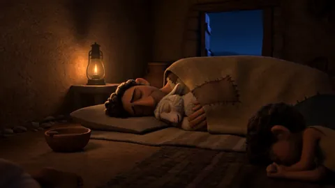 A poor family asleep on mats in a one-room house at night with a small lamb tucked in among them